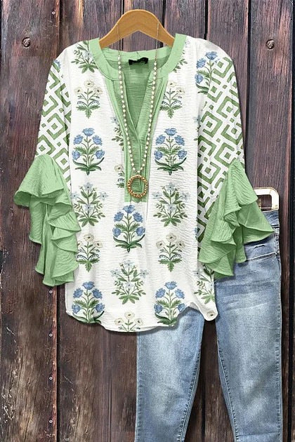 Florina™ - Blus med Blommönster, Volangärmar och Feminint Snitt